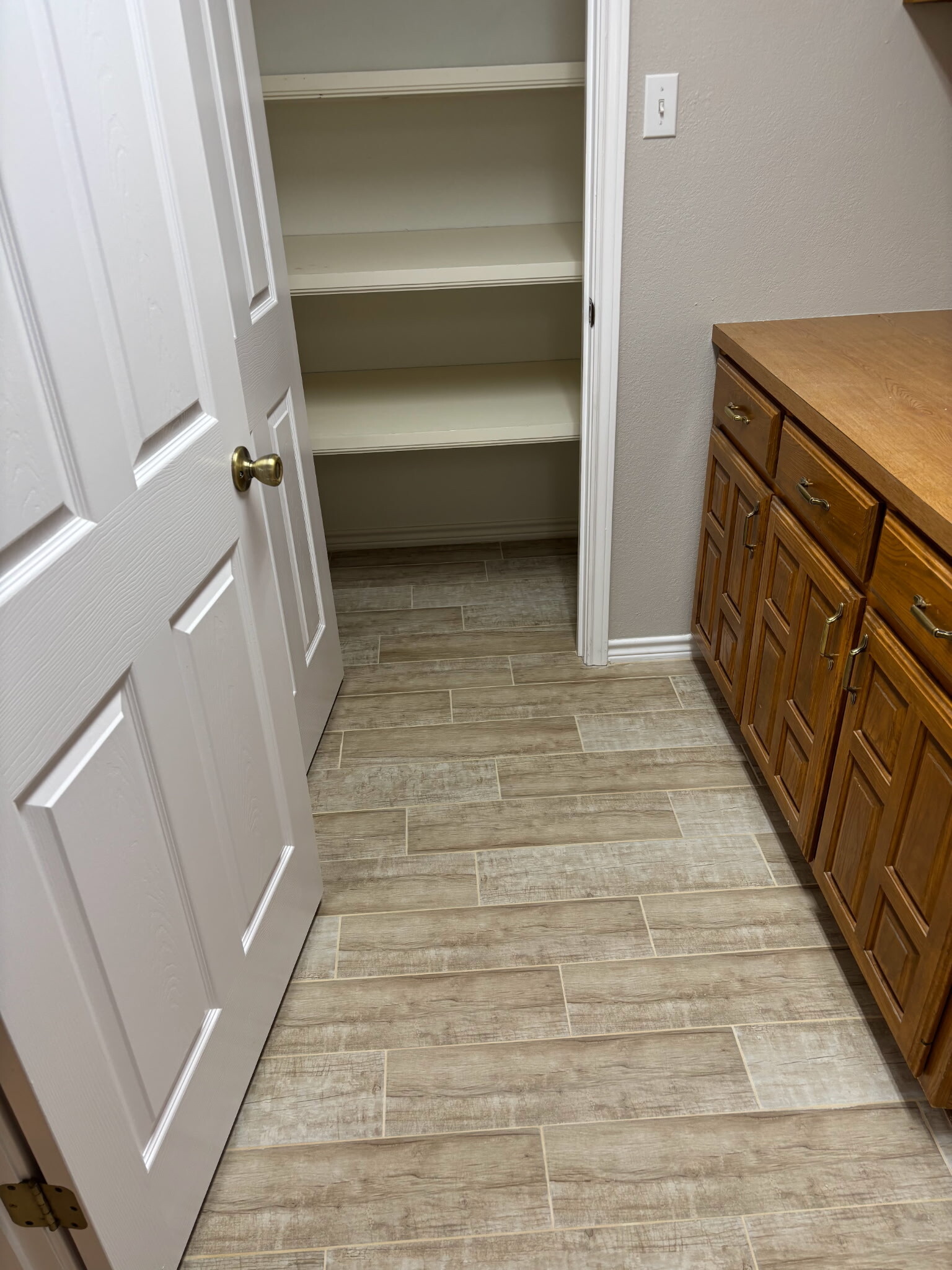 Utility Room with Additional Storage - 203 Bluebonnet St