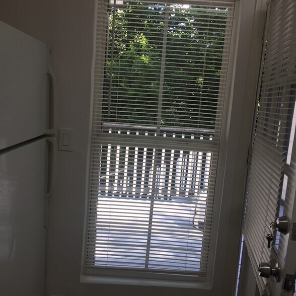 View of porch through window from kitchen - 787 Forrest St NW