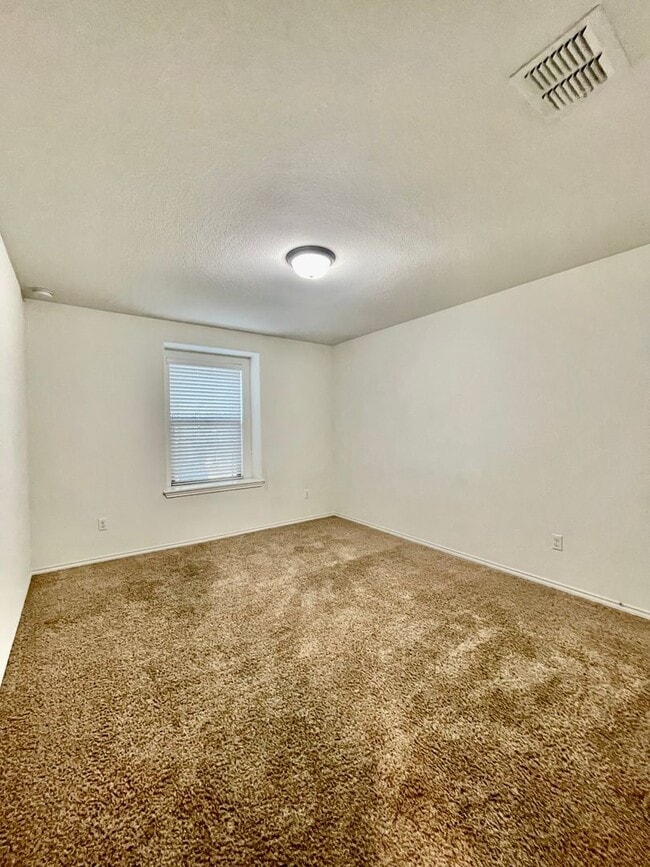 Building Photo - Spacious 4 Bedroom Home with Multiple Living Areas