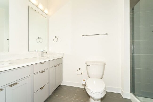 Building Photo - Like New Townhome With Your Own Rooftop Views of Downtown Indy!