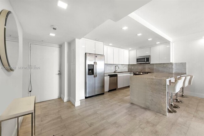 Building Photo - 19390 Collins Ave
