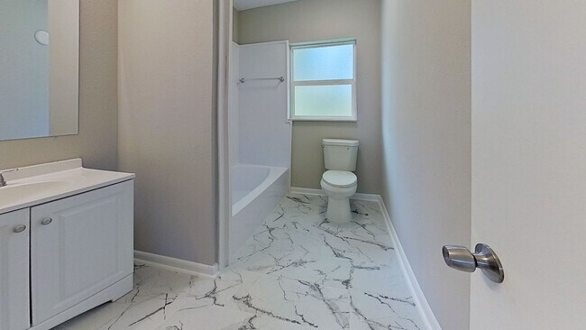 Building Photo - Beautifully Updated 4-Bedroom Home with Modern Finishes & Spacious Backyard