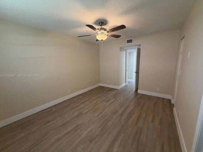 Building Photo - 8443 Royal Palm Blvd