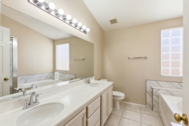 Building Photo - 4 bedroom with NO HOA! New Appliances & New Carpet!