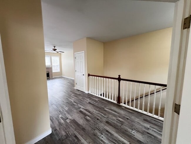 Building Photo - Elegant home in UP with primary bedroom suite on main level