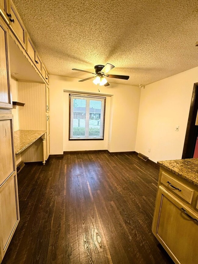 Building Photo - 4 bedroom home with 2 Garages, Finished Basement & Fenced Yard