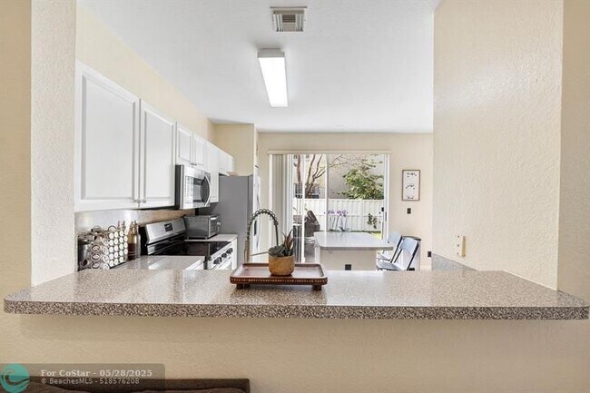 Building Photo - 9090 NW 40th Pl