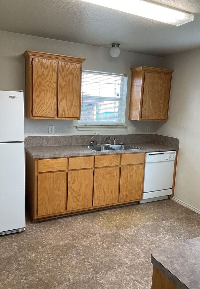 Building Photo - NEW IN MANAGEMENT - AVAILABLE NOW!