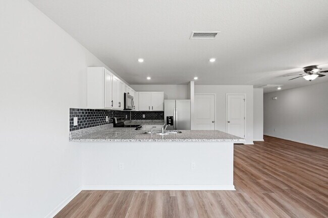 Building Photo - New community! Three bedrooms, two bathrooms and ready for you to move into!