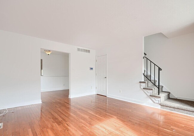 Building Photo - Updated End-of-Group Townhome with Finished Lower Level, Fenced Yard & Community Pool