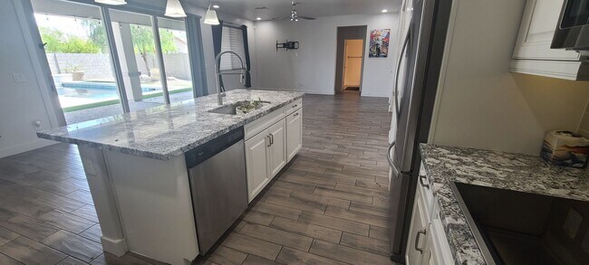 Building Photo - 4 Bedroom 3 Bathroom Upgrade Model Home