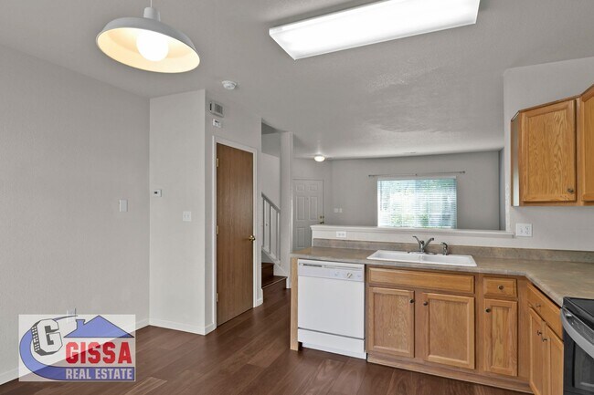 Building Photo - Cute home with engineered hardwood flooring throughout is available now!
