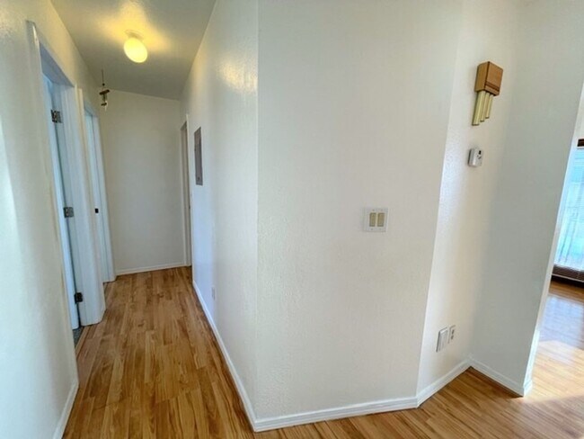 Building Photo - RARE FIND! Spacious and bright three bedroom apartment in South Anchorage with in unit laundry, f...
