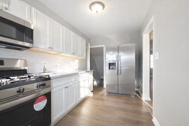 Building Photo - Well-Maintained 4BR Townhome in Prime Baltimore Location