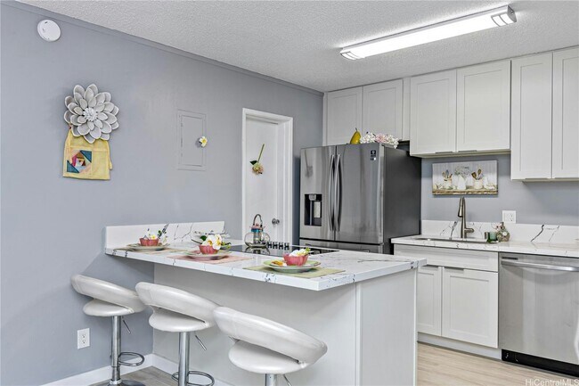 Building Photo - 98-1394-1394 Nola St