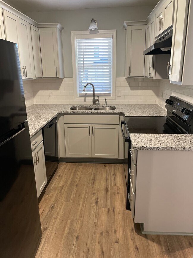 Building Photo - Charming Fully Renovated 2-Bedroom, 1.5-Bath Home for Rent, Lawn Maintenance and W/d Units Included