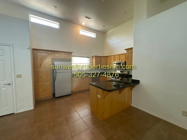 Building Photo - 3 Bedroom, 2 Bathroom Condo with 2 Car Gar...