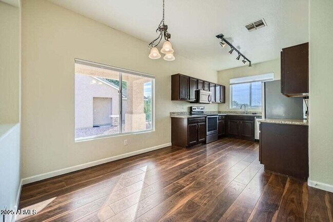 Building Photo - 15436 W Port Royale Ln