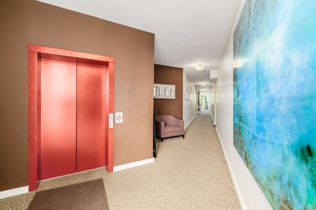 Elevator and 4th Floor hallway - 1300 Northwest Blvd