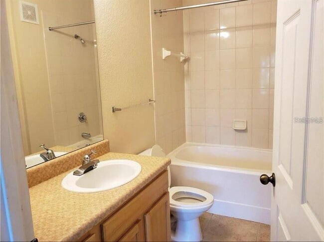 Building Photo - 10213 Courtney Palms Blvd