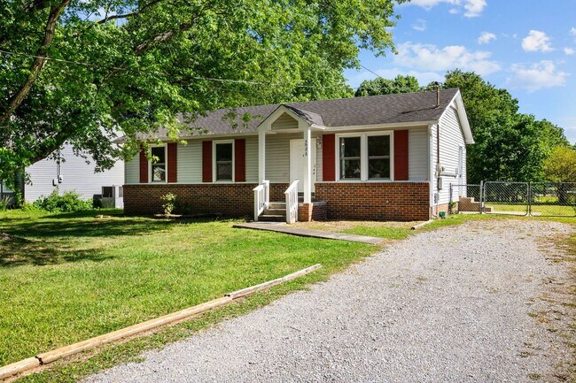 Building Photo - Spacious Yard + Fresh Interior Updates!