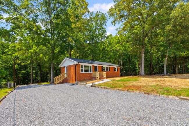 Building Photo - Renovated Brick Ranch with Nature Views + ...