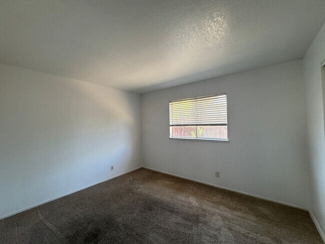 Building Photo - Two Bedroom Triplex with One Bathroom and ...