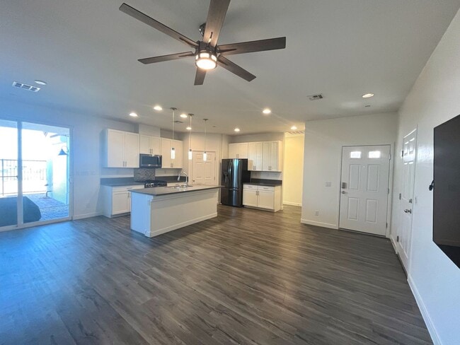 Building Photo - Single-story 1326 sq ft, townhome built in 2019 w/3 bed, 2 bath & spacious attached 2-car garage ...
