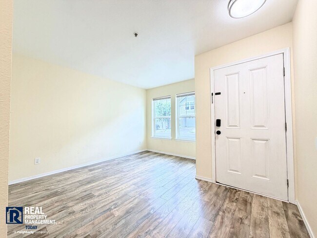 Building Photo - Spacious 4-Bedroom Townhome in Alicia Meadows | Garage, Patio & Pet Friendly