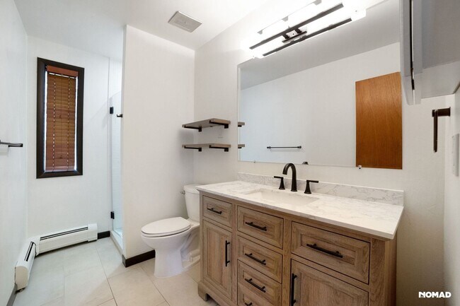 Building Photo - Spacious 4BR Condo in Evergreen
