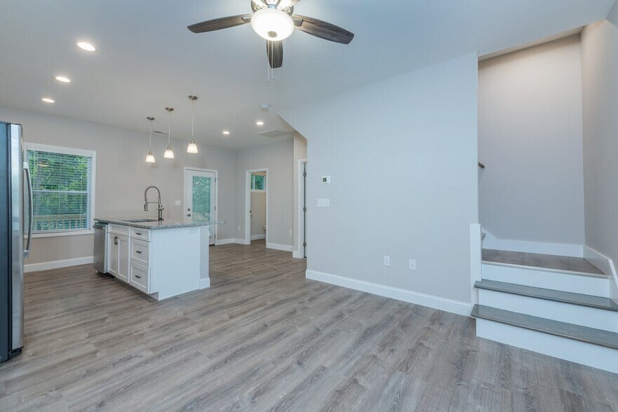 First floor, kitchen, powder, room, primary DD - 107 Owens Creek Rd