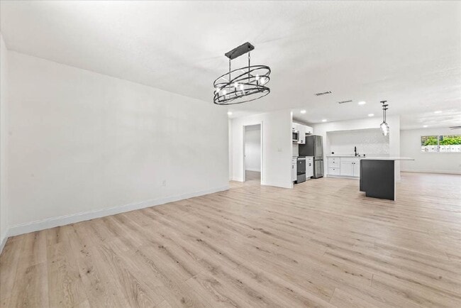 Building Photo - Stunning Newly Rehabbed Single-Family Home — Modern Design • Near Beach, Shopping & Dining!