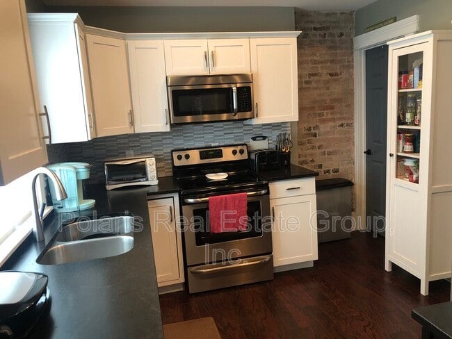 Building Photo - 1403 Spann Ave