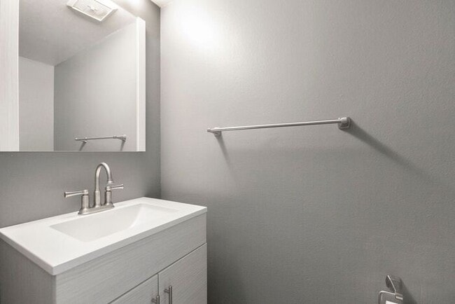 Building Photo - Discover this charming two-story townhome