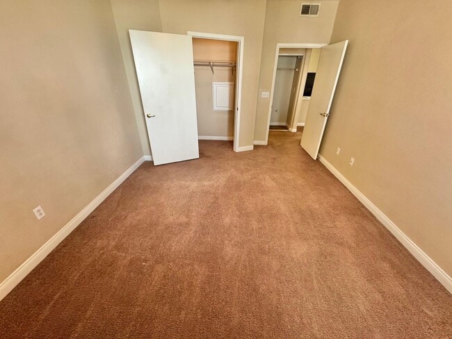 Building Photo - SPACIOUS 1 BEDROOM, 1 BATH GROUND-FLOOR CONDO IN THE GATED TERRASANTA COMMUNITY.