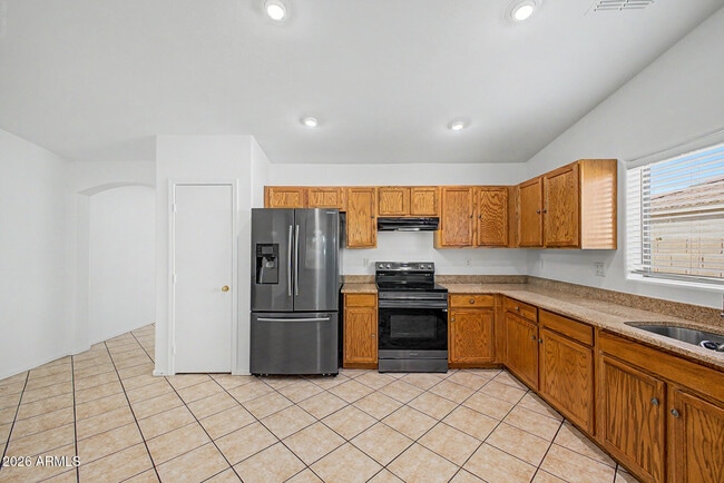 Building Photo - 9631 W Kirby Ave