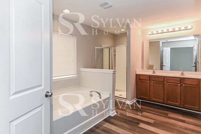 Building Photo - Lease today! No extra charge for contentment and relaxation!