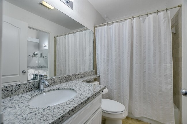 Upstairs bathroom with bath and shower - 1804 Capital Pky