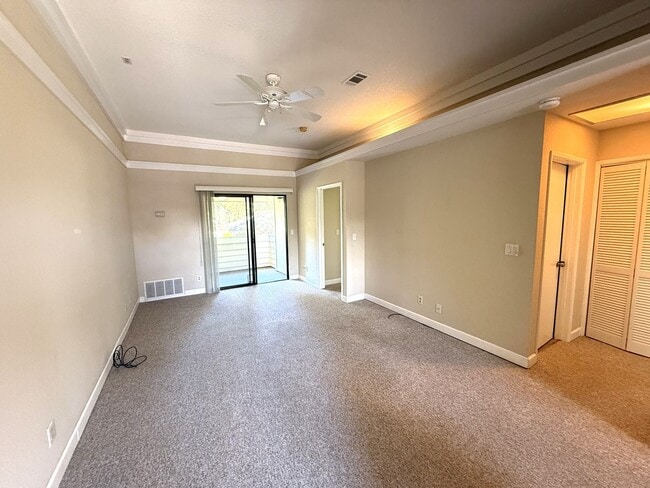 Building Photo - UPPER END UNIT TWO BED / TWO BATH CONDO IN...