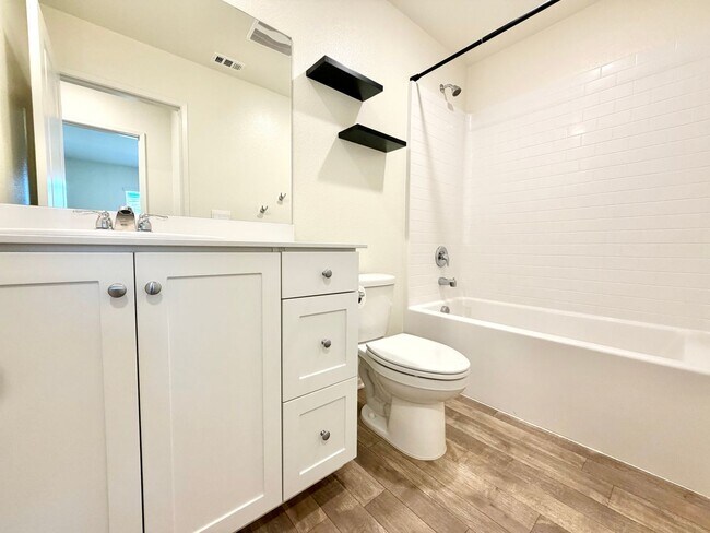 Building Photo - Modern 4 Bedroom 3 Bathroom Living with INCLUDED Solar & Entertainer’s Backyard