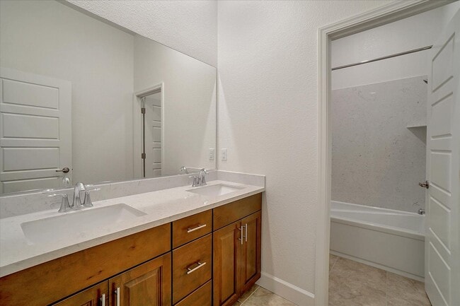 Building Photo - FULLY FURNISHED - ALMOST NEW 4 BED, 2.5 BATHS, 2 CAR GARAGE, 1 STORY IN NORTH LAKE COMMUNITY, NOR...