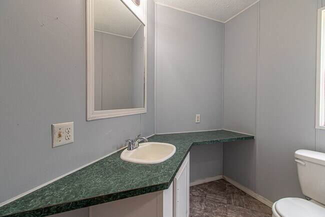 Building Photo - "Charming 2-Bed, 2-Bath Mobile Home Retrea...