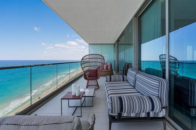 Building Photo - 10203 Collins Ave