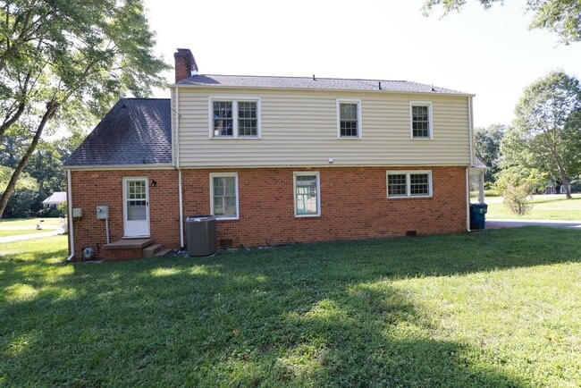 Building Photo - Incredible 2 story in West End with huge wraparound lawn
