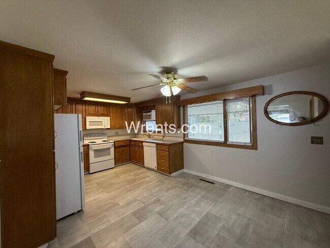 Building Photo - Now Available: Spacious 4-Bed, 2-Bath Home in Town & Country