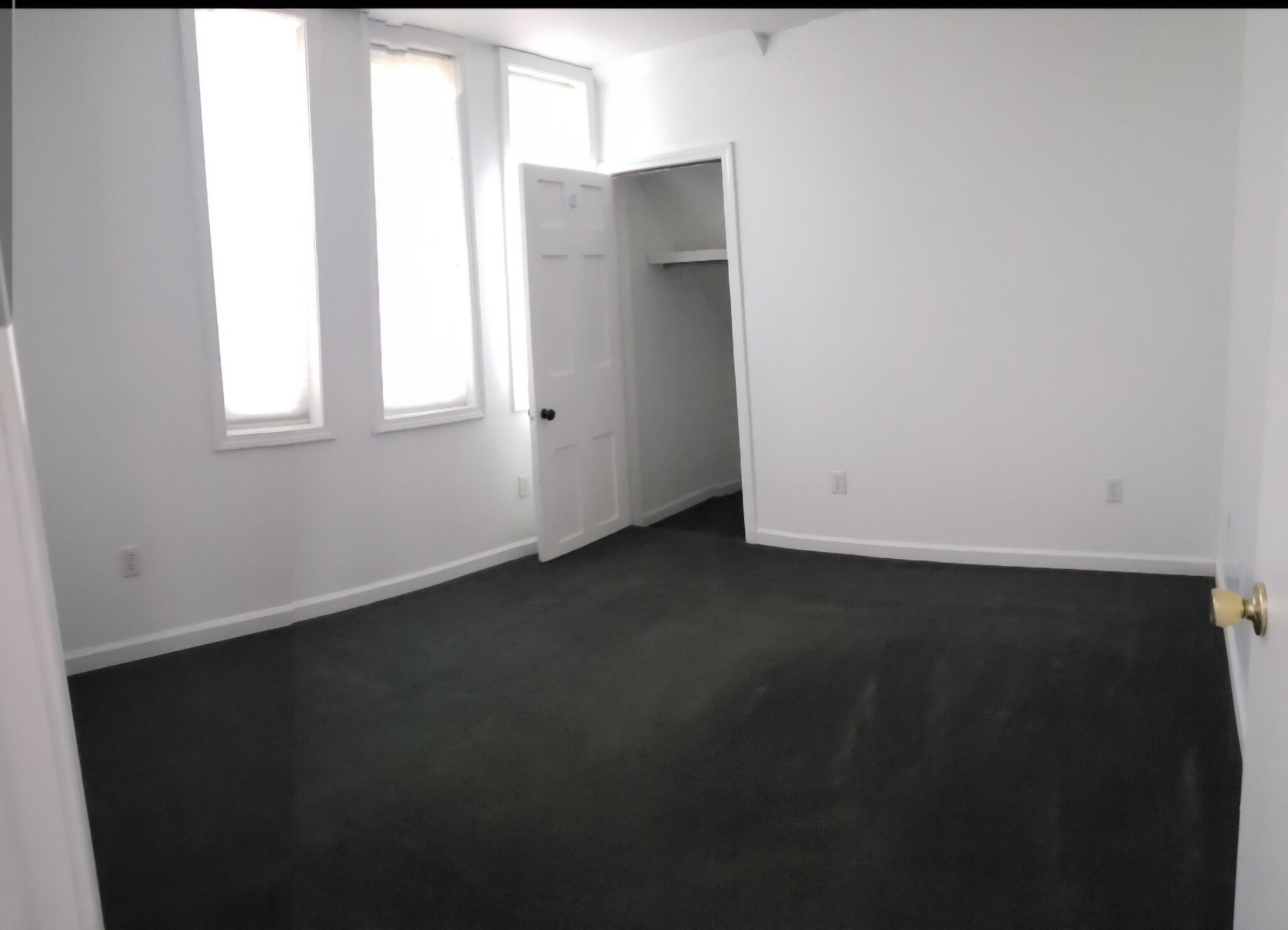 Old picture, Bedroom has matching flooring as rest of the apartment. - 89 S Main St