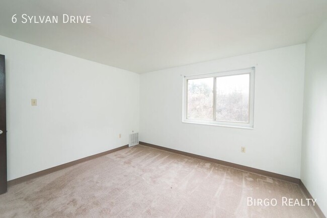 Building Photo - Warm up next to the fire in this 2 bedroom...