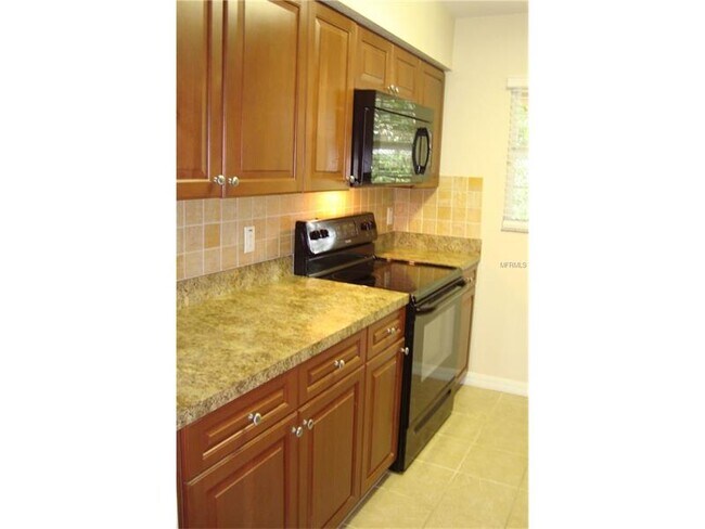 Building Photo - 4864 Tangerine Ave