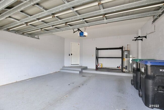 Building Photo - Luxurious 4/3 Waterfront Home with an In-ground Spa, an In-law Suite and a 2 Car Garage in the Hi...