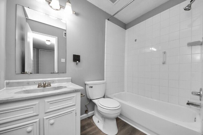 Building Photo - No Carpet. Private Yard. Extra Storage. What More Could You Ask For?